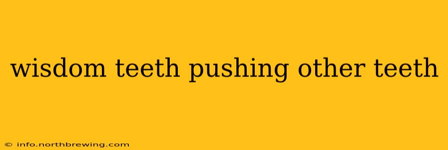 wisdom teeth pushing other teeth