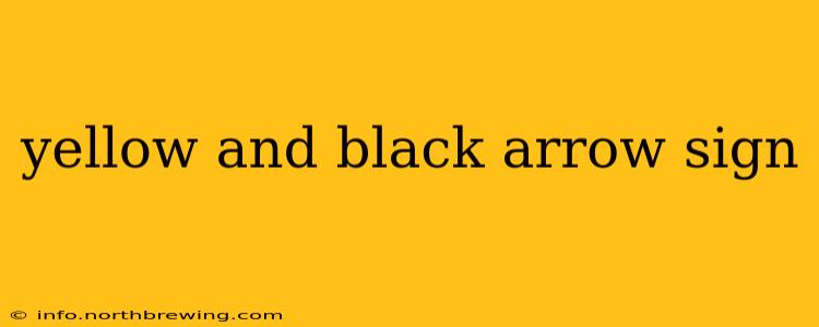 yellow and black arrow sign